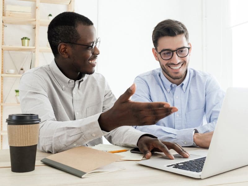 Experienced legal team of Ndumbe & Partners collaborating in a modern office environment.